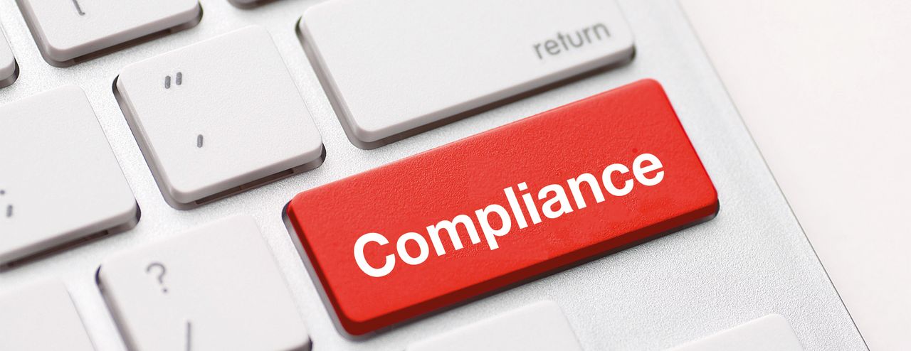 Rote Tastatur mit der Aufschrift: Compliance