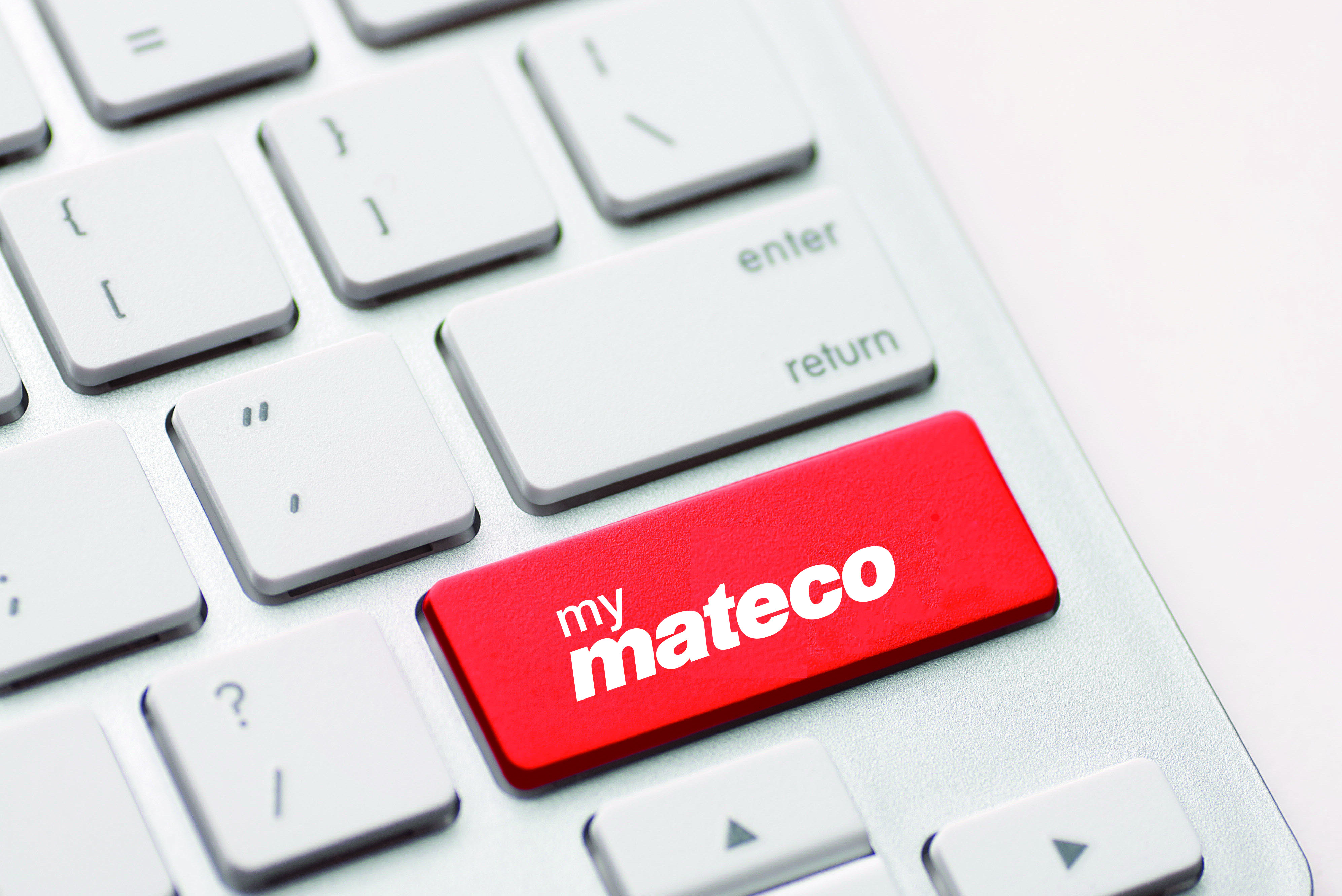 Rote Taste auf einer Tastatur mit der Aufschrift: my mateco